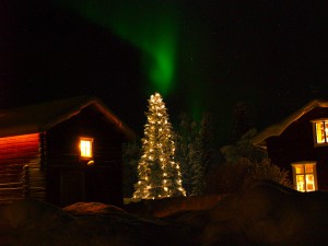 Northern-light over barn in Lapland
