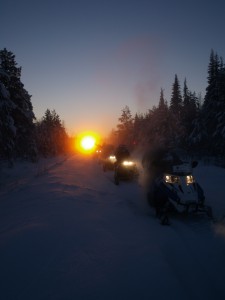 Snowmobile safari above the Arctic Circle