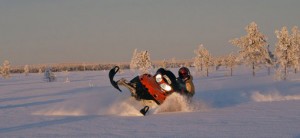Deep snow snow mobile riding