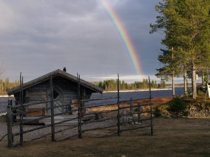 Sauna and rainbow Lainio-river