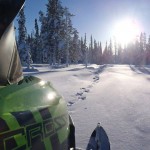 Snow mobile and reindeer tracks